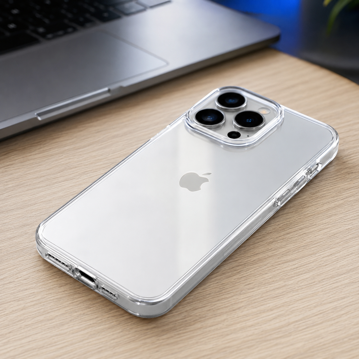 Ultra-thin clear phone case fitted to a silver smartphone on a modern desk