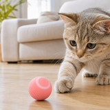 One pink 150mAh automatic rolling cat toy ball with cat