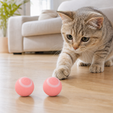Two pink 150mAh automatic rolling cat toy balls with cat